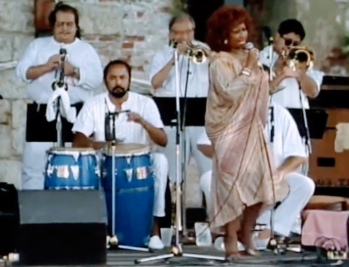 Jose Madera performing with Celia Cruz.